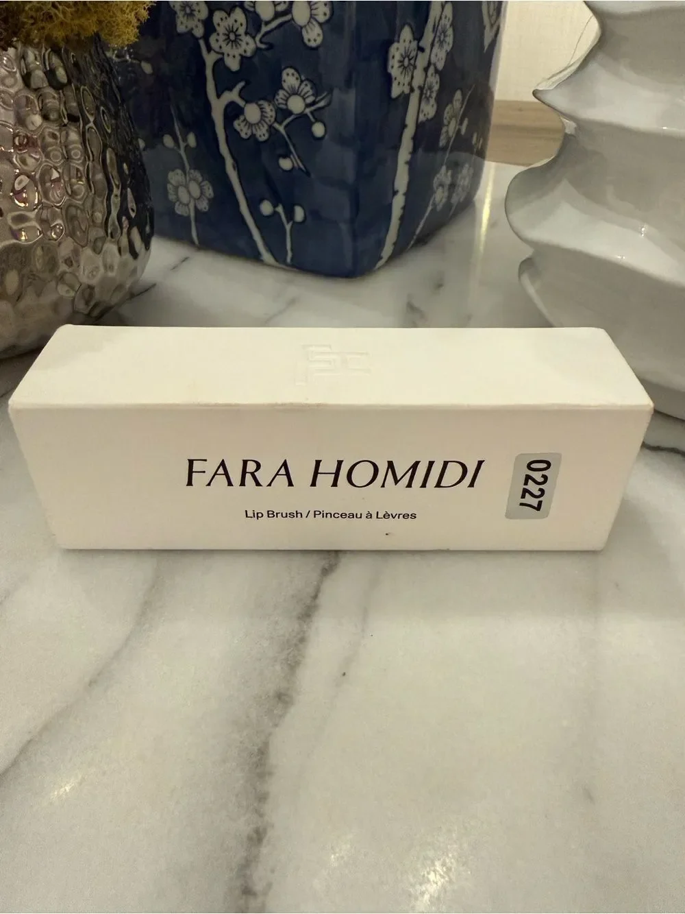 Fara Homidi new box
